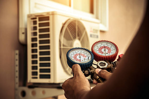 Professional Hvac technician working in Sunderland, MD